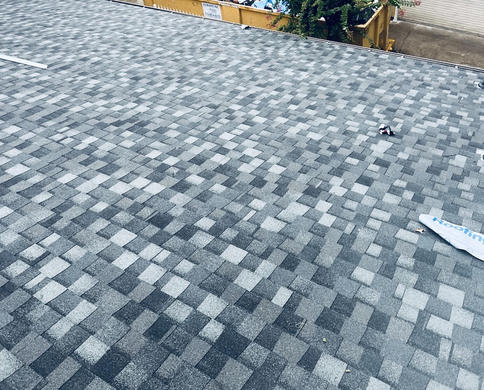 Single roof replacement on a residential home in Houston completed by Pride Construction & Roofing using architectural shingles for long-lasting protection.